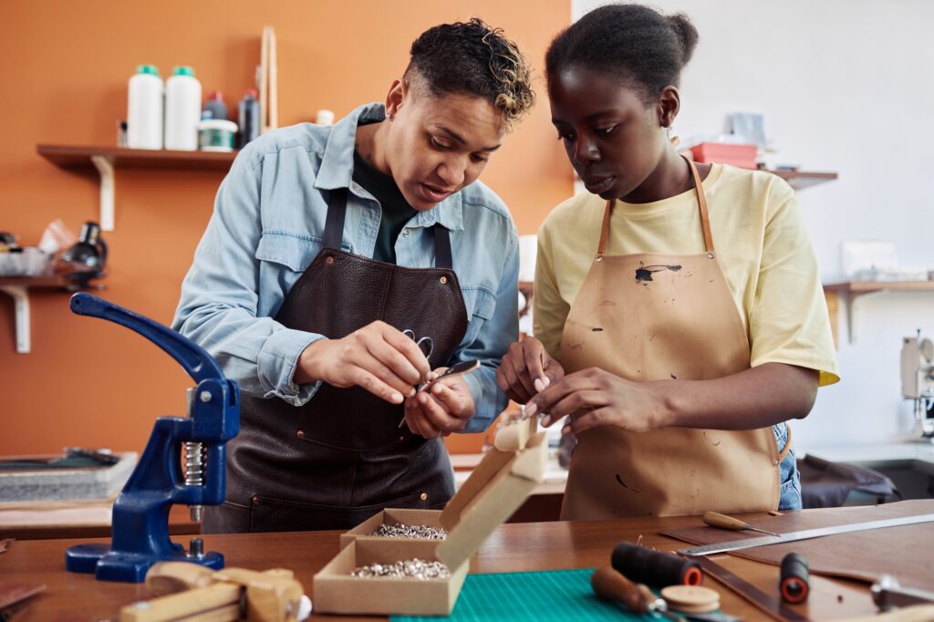 Female Artisan Teaching Apprentice